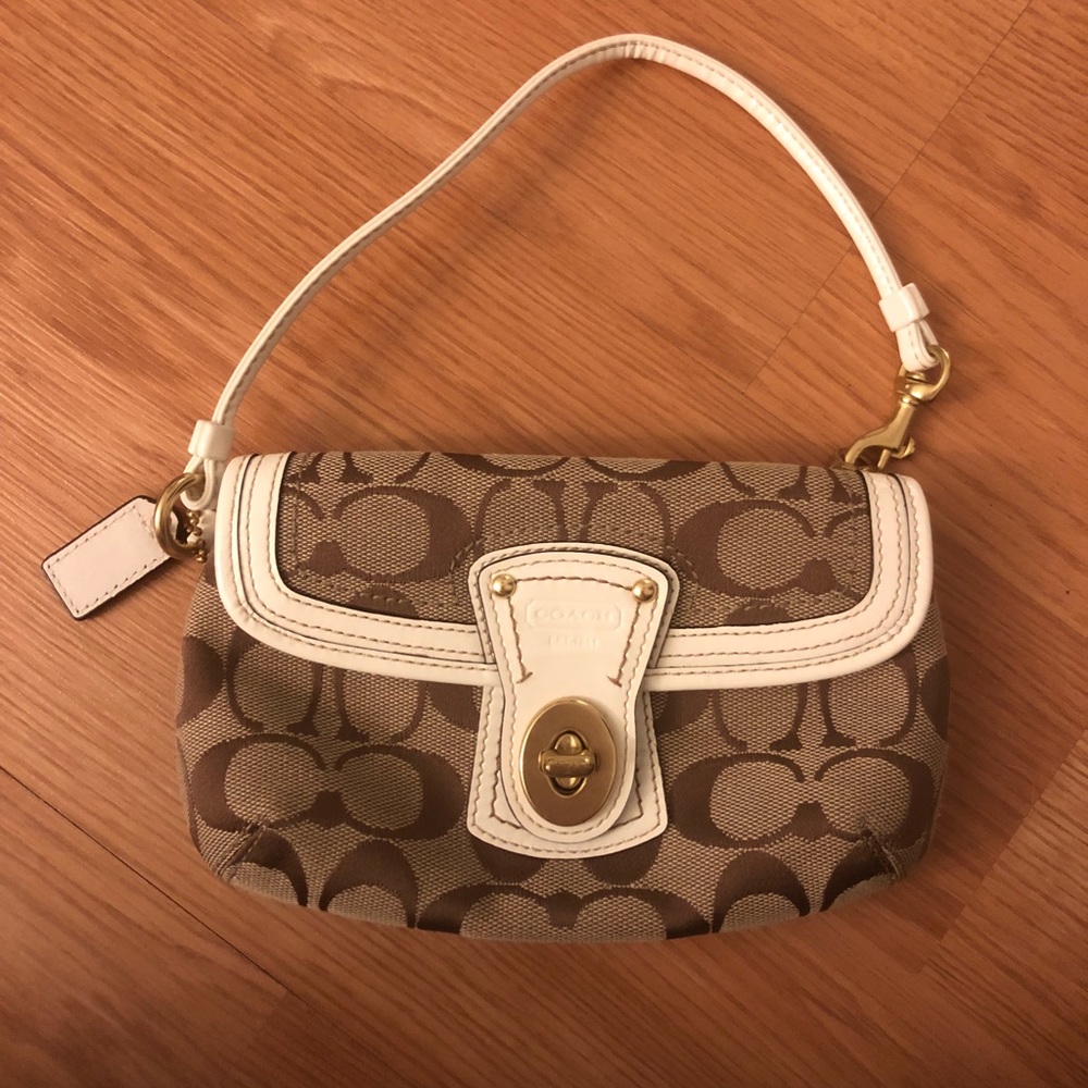 Coach purse. Brown with white detail on the front